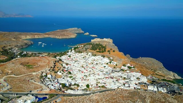 Lindos is a town on the Greek island of Rhodes. It&rsquo;s known for its clifftop acropolis, which features monumental 4th-century gates and reliefs from about 280 B.C.