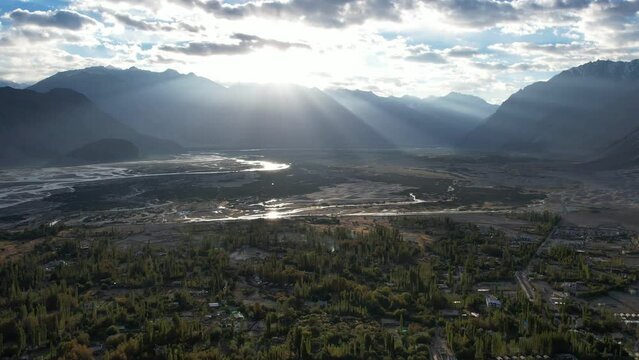 aerial view of Hunder village in Himalayas in the morning, background in Nubra Valley, Ladakh, India.