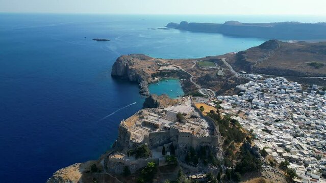 Lindos is a town on the Greek island of Rhodes. It&rsquo;s known for its clifftop acropolis, which features monumental 4th-century gates and reliefs from about 280 B.C.