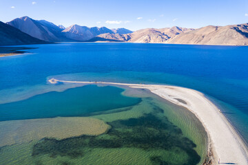 Aerial landscape of Pangong Lake  and mountains with clear blue sky, it's a highest saline water lake in Himalayas range, landmarks and popular for tourist attractions in Leh, Ladakh, India, Asia