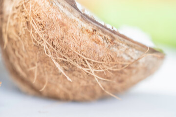 Cracked Coconut shell pieces on a table