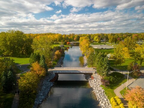 Aerial shot of the scenic Emerson Park in Auburn New York with flowing water and green vegetation