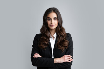 Portrait of successful business woman in suit on gray isolated background. Female office worker, success manager. Serious office female worker, manager employees.