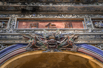 detail of the facade of the imperial gate in Hue Vietnam