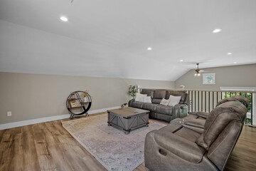 Beautiful interior design of a second floor lounge area in a modern new England colonial home