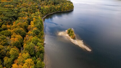 Drone shot of the New Croton Reservoir on a sunny day in autumn © Audley C Bullock/Wirestock Creators