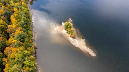 Drone shot of the New Croton Reservoir on a sunny day in autumn