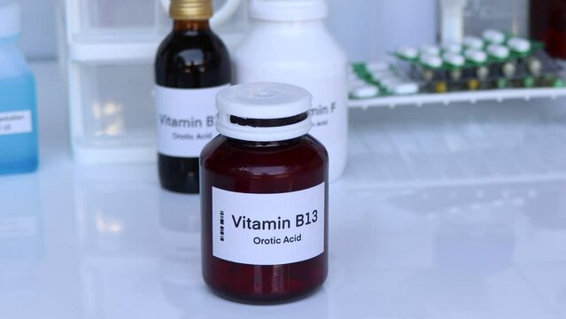 Vitamin B13 pills in a bottle, food supplement for health or used to treat disease
