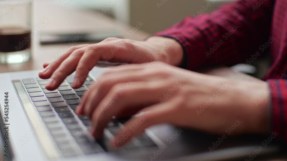 Wall mural close up of freelancer's developer hands typing program code on laptop keyboard in coworking. busine