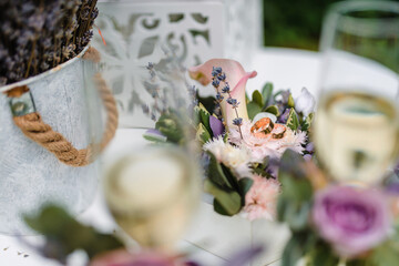 two wedding rings lie on a box with flowers, wedding decor