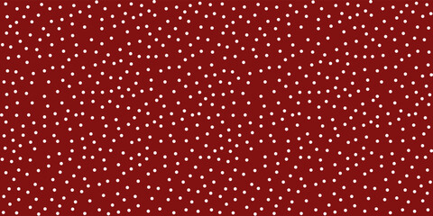 Christmas red and white polka dot pattern. Editable vector seamless pattern of winter snowfall for celebration or festive design, social media or web materials. © ChristinaMM