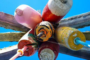 Buoys hanging on a dock in Boothbay Harbor,  Maine