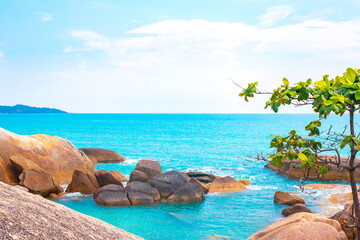 Beautiful seascape.Rocky shore of the blue sea on the tropical island of Koh Samui in Thailand. Travel and tourism