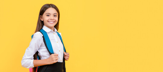 smiling teen girl in school uniform carry backpack, knowledge day. Portrait of schoolgirl student,...
