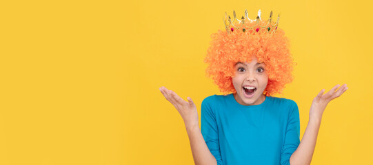 surprised selfish child girl in curly wig and princess diadem, surprise. Funny teenager child in wig, party poster. Banner header, copy space.