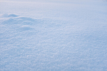 Snow background, top view. Fresh snow texture for publication, poster, screensaver, wallpaper, postcard, banner, cover, post. Winter backdrop. High quality photo