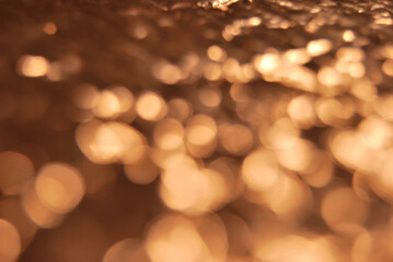 Fototapeta premium Golden de focused sparkle glitter background close up
