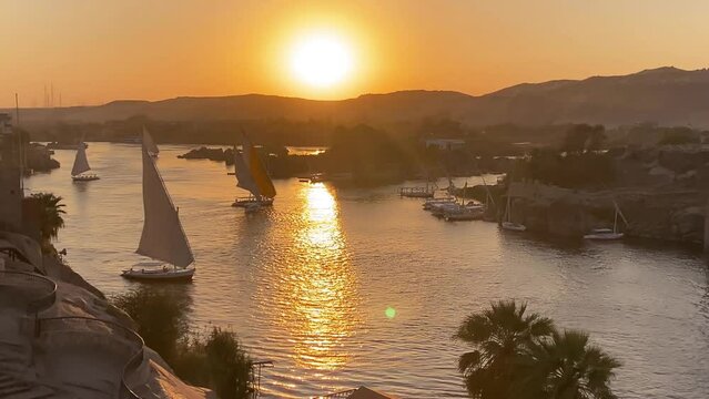 Beautiful landscape with felucca boats on the Nile river in Aswan, Egypt