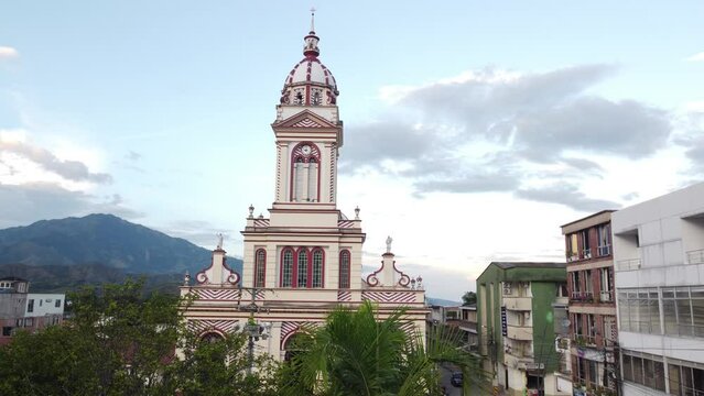 Upward aerial view of the town church in chaparral tolima colombia. concept of travel and towns