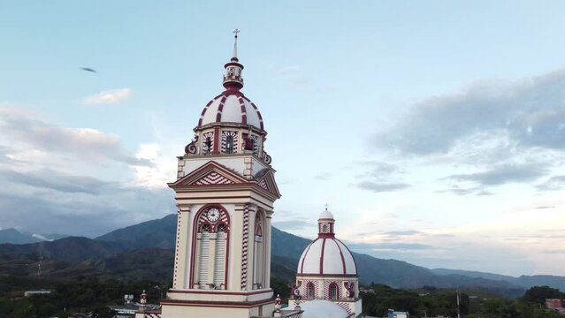 Upward aerial view of the town church in chaparral tolima colombia. concept of travel and towns