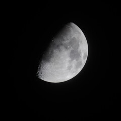Half moon with black sky background at night