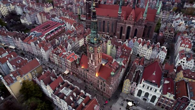 Drone video. Flying drone over evening city. Top down. Urban landscape. Church in Krakow, Poland, Europe