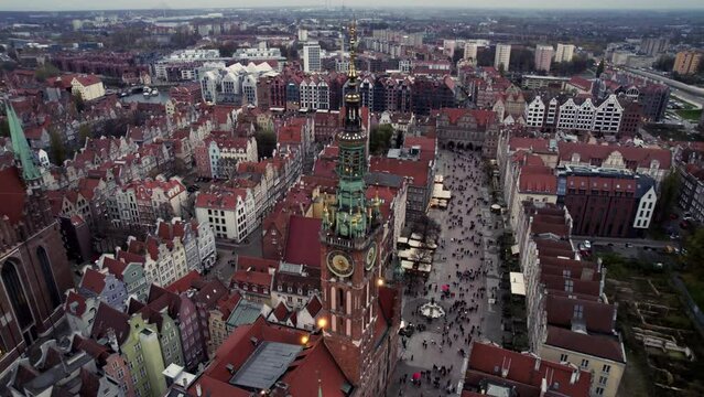 Drone video. Flying drone over evening city. Top down. Urban landscape. Church in Krakow, Poland, Europe