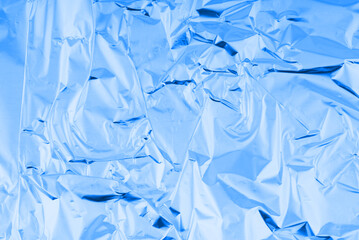 Obraz premium Abstract texture of slightly crumpled blue color. Closeup