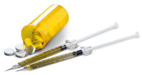 Drug abuse concept and two heroin syringes