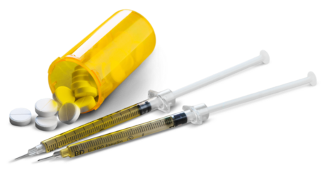 Drug abuse concept and two heroin syringes