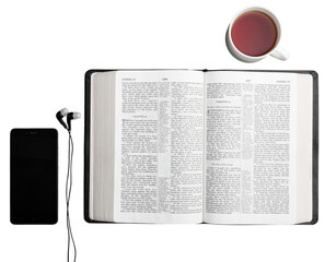 Office workplace with phone and open bible