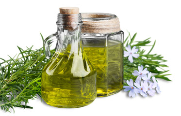 Rosemary essential oil in glass bottle