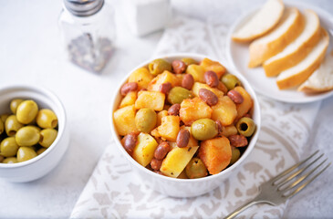 Puerto Rican traditional potato red kidney bean stew in a bowl