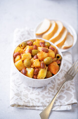 Puerto Rican traditional potato red kidney bean stew in a bowl