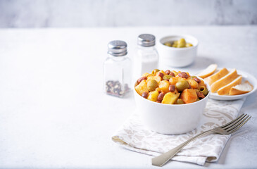 Puerto Rican traditional potato red kidney bean stew in a bowl