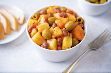 Puerto Rican traditional potato red kidney bean stew in a bowl
