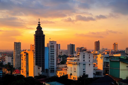 Colombo Sri Lanka skyline cityscape photo. Sunset in Colombo with views over the biggest city in Sri Lanka island. Urban views of buildings and the Laccadive Sea