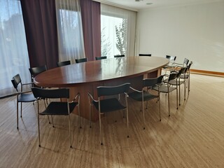oval meeting table with chairs