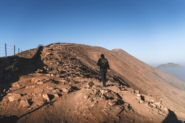 landscape in the morning with hiker walking.