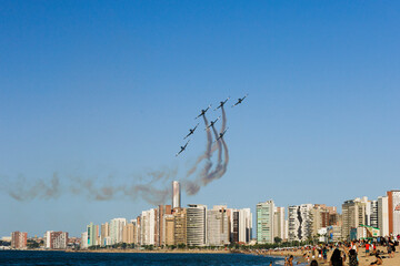 planes fly over the beach of the city of Fortaleza Brazil