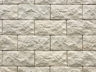 Closeup of a decorative wall made of concrete blocks.