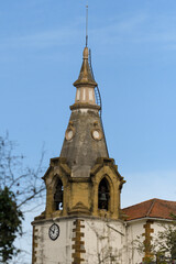 Fototapeta na wymiar Bell tower of the church of San Esteban in Galdames