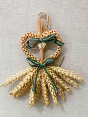 Traditional scandinavian straw christmas ornament on display.