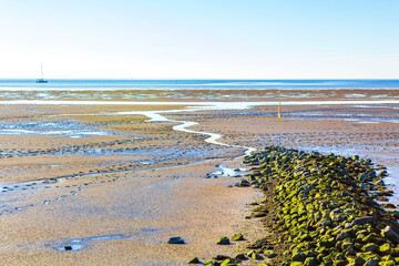 Beautiful coast mudflats and wadden sea seascape landscape Dorum Germany.