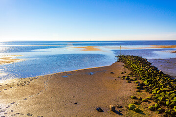Beautiful coast mudflats and wadden sea seascape landscape Dorum Germany.