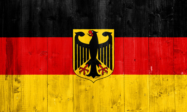 Flag of Germany on a textured background. Concept collage.