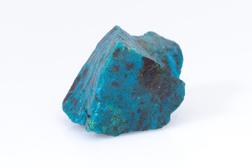 Natural Chrysocolla stone on a white background. Mineral of blue and bluish-green color on a white...