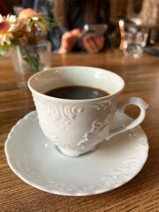 coffee in vintage white cup