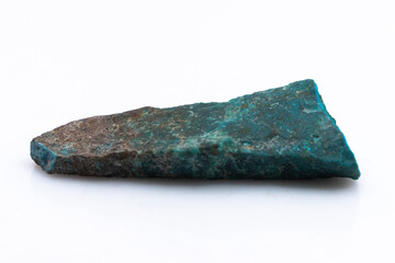 Natural Chrysocolla stone on a white background. Mineral of blue and bluish-green color on a white background