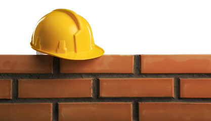 Hard hat on cement masonry layer